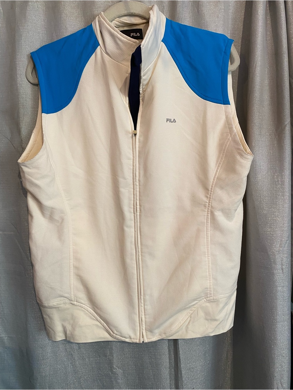 white and blue FILA full-zip vest
Women’s